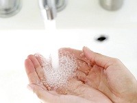 Hands Under a Running Faucet Washing Sink Cleaning