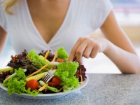 Woman Eating Salad